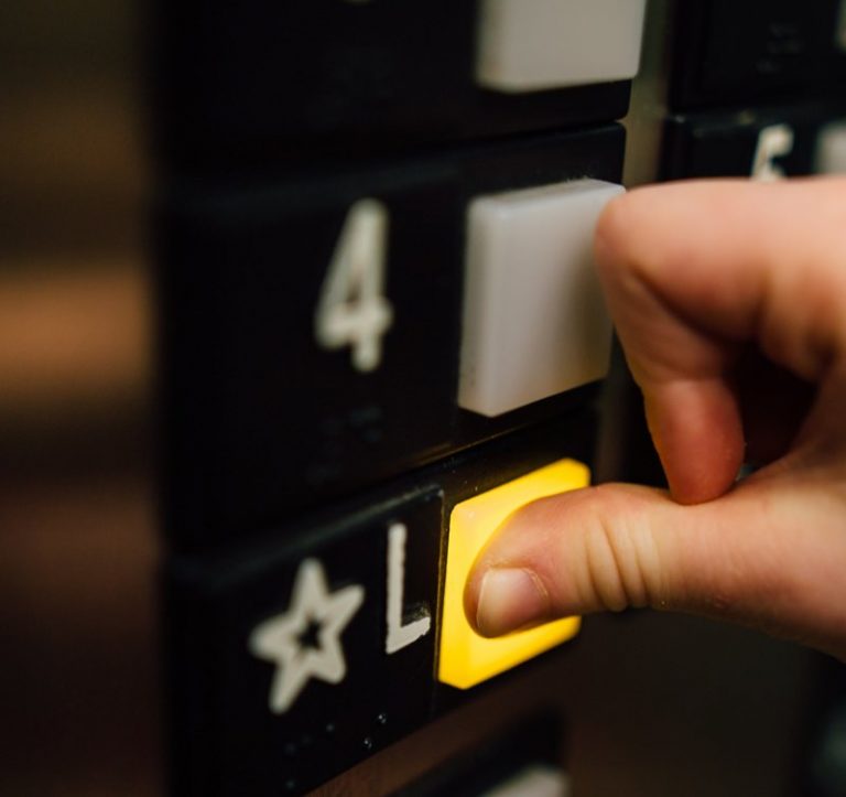 pressing-elevator-button