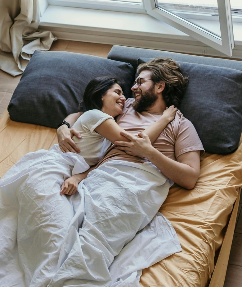 Couple safely in bed